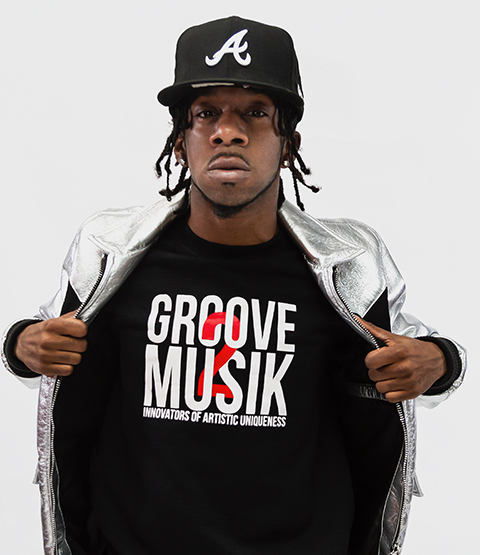 Picture of D-Ray Colson wearing a Groove2musik t-shirt from the Groove2Musik store